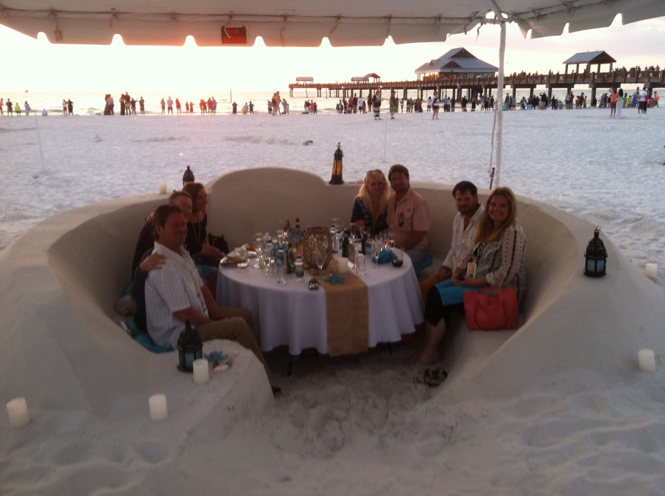 Guests Dining in the Sand