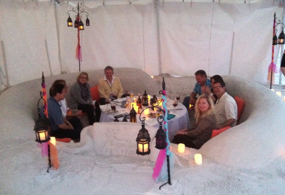 Guests Dining in the Sand