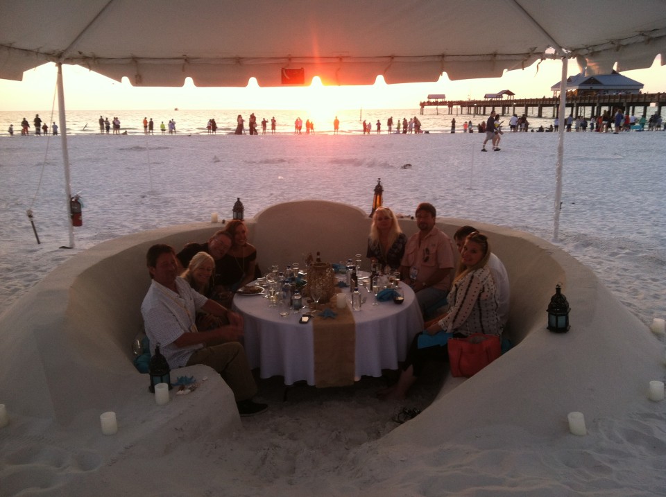 Guests Dining in the Sand