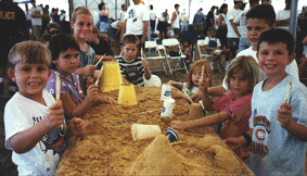 Shark Tooth Kids show their tools and smiles